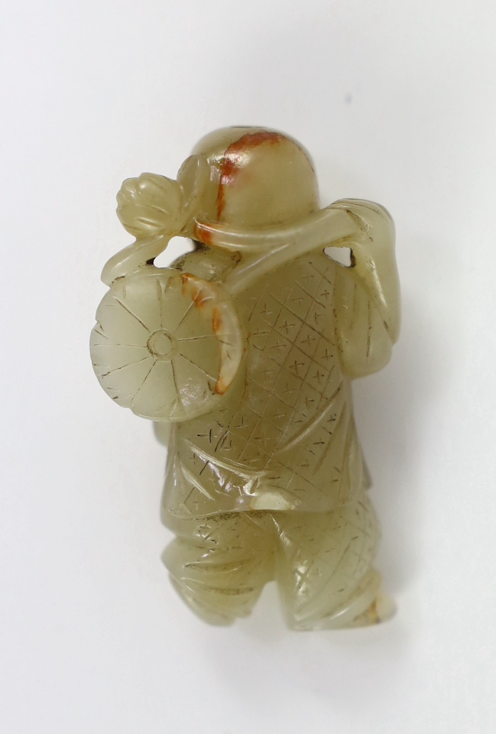 A Chinese pale celadon jade figure of a boy, 19th century, 4.1cm high